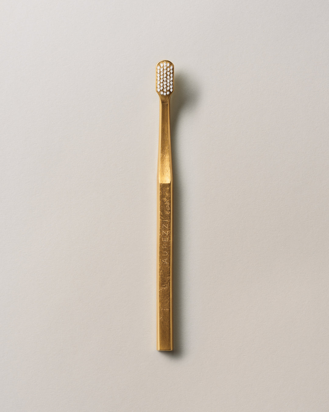 SPAZZOLINO ORO/BIANCO