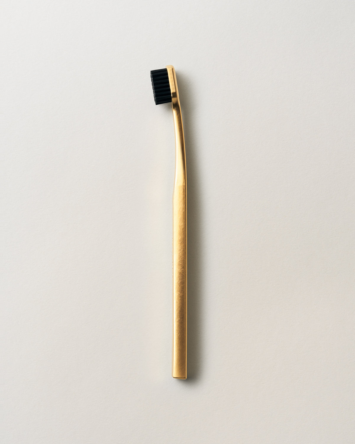 TOOTHBRUSH GOLD/BLACK – AUREZZI
